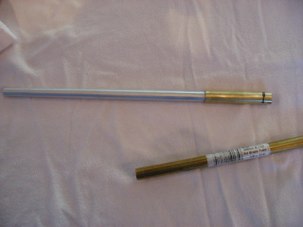 Pic 123 shows the barrel from the Easy Eight kit, after it has been sleeved with brass tubing stock.  This increased the diameter of the barrel, and lengthened it to join with the recoil unit.  It also provides a uniform outside diameter which is important for later on.