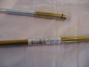 Pic 124 shows the brass tube stock that would form a sleeve through the mantlet.  The uniform O.D. of the barrel with the sleeve is paramount, the idea being the two brass tubes would nest inside each other to allow the barrel to slide back and forth during the recoil cycle.