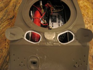 Schumo’s replacement parts include the sheetmetal forward ventilator cover.  The hatches have been opened with thread and a lip has been added with sheet styrene.