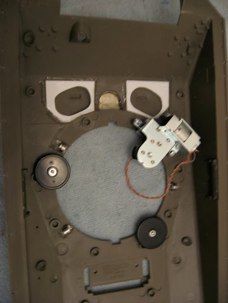 Styrene hatch lip can be seen beside the ventilator hole.  A DAK created tip, use surplus bearings and tube for a turret roller bearings.  This will improve many aspects of the vehicles performance.