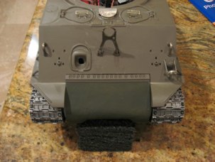 Other front end modifications...  Shorten and move the gun barrel travel lock.  The 75mm and 76mm tanks had the travel lock midway up the glacis.  the 105 was lower and had a longer reach.