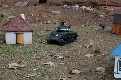 With metal track, motor plate, impact gear boxes, resin turret, and all the rest of the trimmings.... this tank is really heavy for a Sherman!