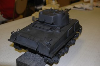Doug Sharpe was the point man on this project.  He assembled a Tamiya sherman essentially box stock but added our DAK 75mm Conversion and some Schumo goodies.  The Applique armor is also resin from TankZone.
