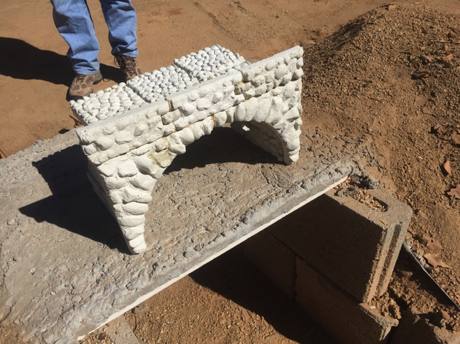 More cast concrete block building tunnel structures.