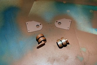 In order to use up some half empty spraycans, I used Light Earth to act as Red/Brown Primer.  Also Painted in this stage were the transmission adaptor metal parts. the Idler Wheels.....
