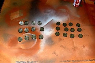 Bogie wheels get painted.  I tend to line them up to maintain the correct count.  Saves time later.