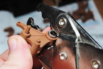 Here is my technique for placing the bearings.  I use an old crimping tool to place even pressure on the bearing.