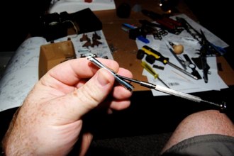 I assemble a shock absorber.
