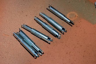 I tend to paint them in the closed position in order to keep some metal bare for later.