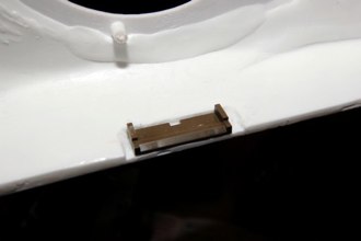 I begin the upper hull by grinding out the areas where the upper and lower clamps will go together.