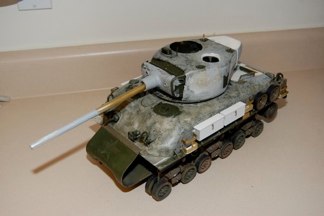 My progress to date.  MAto Cast Hull.  TAmiya Lower hull and HVSS.