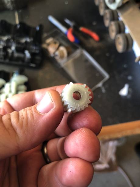 Vinyl gears sheared teeth.