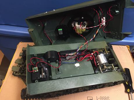 To those of us who don't even pretend to run stock Heng Longs it only takes 4 screws to get inside.
