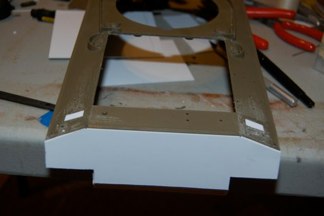 Rear hull plate added.  M4A3 hulls had a different rear hull slope and exhaust arrangement.  Engine deck also removed to accomodate the GAA engine grilles.