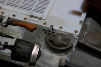 Fuel filler caps detailed with chain and pins.
