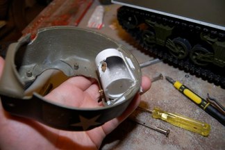 Inspiration hit me for the elevation mount.  I am using a piece of surplus PVC (from the club banner) to make a pivot inside the resin rotor shield.