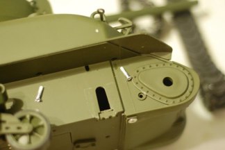 To take the kit apart you have to remove sprocket, remove tracks and then undo the 8 screws below the hull sponsons.
