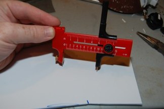 Use a circle cutter to make a pilot channel.