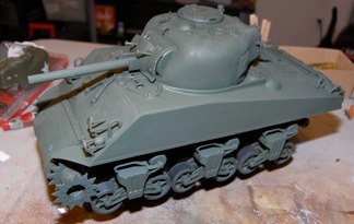 Tank sprayed over all in tamiya field grey.