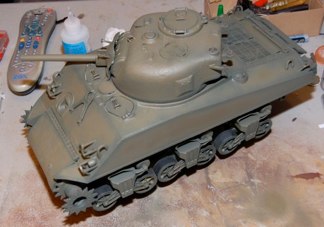 Next I cover in my testors OD.  I am using a color modulation technique and a pre-shading pattern.  Basically I fill in the center of the main panels leaving the edges darker.  This adds depth and cointast to a monochromatic vehicle.