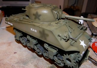 After some more Post shading witH Tamiya OD, (XF-62 apparently is a good match for wartime OD but I like a more faded look) and a Tamiya clear laquer coat, I applied tamiya decals and dry transfers.