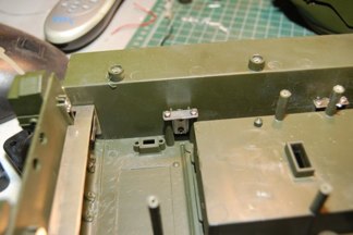 VVSS mounted to mato hull with a metal plate that slides up on out and the suspension then pops off the hull.