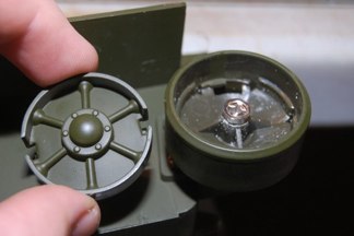 Idler also pops off to access the mounting screw.