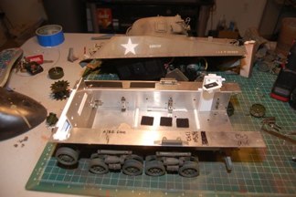 Tamiya metal hull must be adjusted to fit.