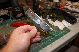 Start by cutting the backing off Mato suspension mount.
