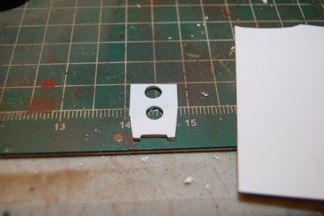 there is a bit of dead space in the bogie mounting assembly., i fixed it by making 6 filler plates...