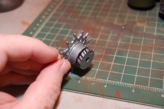 Sprockets were made from tamiya parts by using two “inner” halved and cutting one down with a hacksaw.