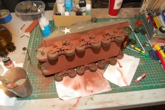 time for a repaint.  Hull red used to prime.