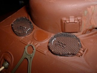 Now to the mesh cages attached to the hatches to prevent infantry from getting at the crew.  I uses more of the window screen material and used fine wire and super-glue to attach them together.