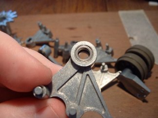 I installed bearings into the bogie arms to improve performance.