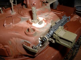 I finished the reconstruction of the turret roof by replacing the MG mount with parts from the Pershing.  I even added the rubber cap used to seal the mount.  I plan to leave the MG in the rear cradle for no other reason than it looks cool.  I will add chain and retainer to the mount soon.