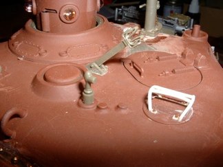 I also replaced the kit part with the Pershing MG barrel holder and added a brush guard to the periscope on the turret roof.