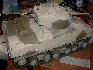 I know these two coats look a bit sloppy, but I plan to carefully mask the brown coat that comes next.  I need to have a hard edge on the scheme as much of it was applied by roller and brush.  Depot level maintenance did use spray guns for the initial over coats, but many field units modified their schemes by hand.