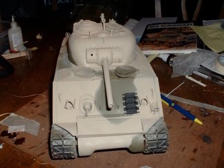 The irony of this was the modifications were done after loses in previous battles had shown the OD tanks stood out on sandy beaches.  The new sand colored Shermans stood out against the volcanic sand of Iwo Jima.  The USMC Forest Green and OD schemes would have blended better and most US Army machines remained OD.  I like the USMC scheme.