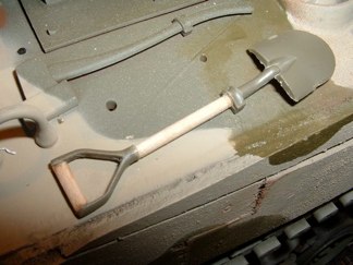 I super detailed the pioneer tools by replacing wood handles with.... wood.  The track tensioner tool received an accurate circular mount with locking pin and metal bracket.  The axe and pick may get the same treatment later.