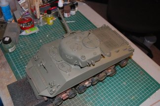 A few hours later I applied a Camoflage coat of Testor’s Acrylic OD with the old Iwata.