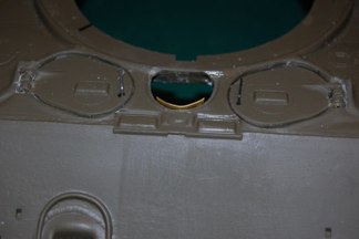 Many photo graphs I have seen show these vents dinged and dented so I went that route