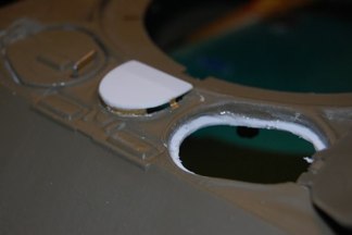 I super glued my plastic piece in place, and used more scrap photo etch to finish the piece.