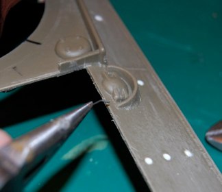 I made the pin from steel wire and used pliers to push the pin to its correct location.