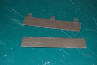 I am going to try an improvement.  Step one is to cut the piece in two and sand off the plastic hinges.
