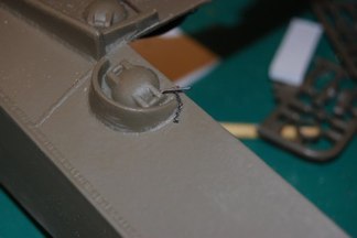 Voila, Armored fuel filler cap with locking pin and chain retainer.