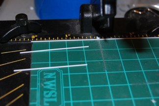 I had a supply of .035 rod and I began by cutting 1+ 7/8 inch bars.