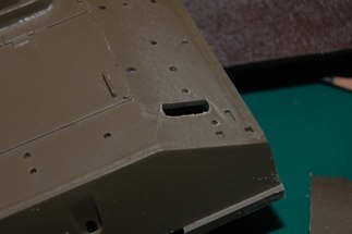 To make a JUMBO you first have to make the Sherman an M4A3.  On the hull rear you must remove the vents for the fuel tanks.  Many -A3 models had these faired over with an oval plate, I choose to delete them completely and smooth it over.