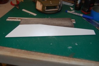 I cut out the side armor plate using the tamiya hull as a template.