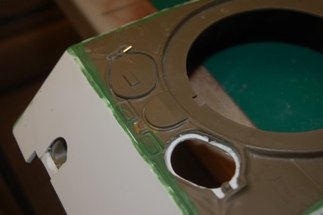 Next step is to drill out the hinges and place brass tubing through the pilot holes.
