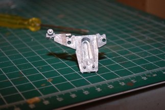 The large protrusion on the back must be removed to fil flush on the Tamiya hull.